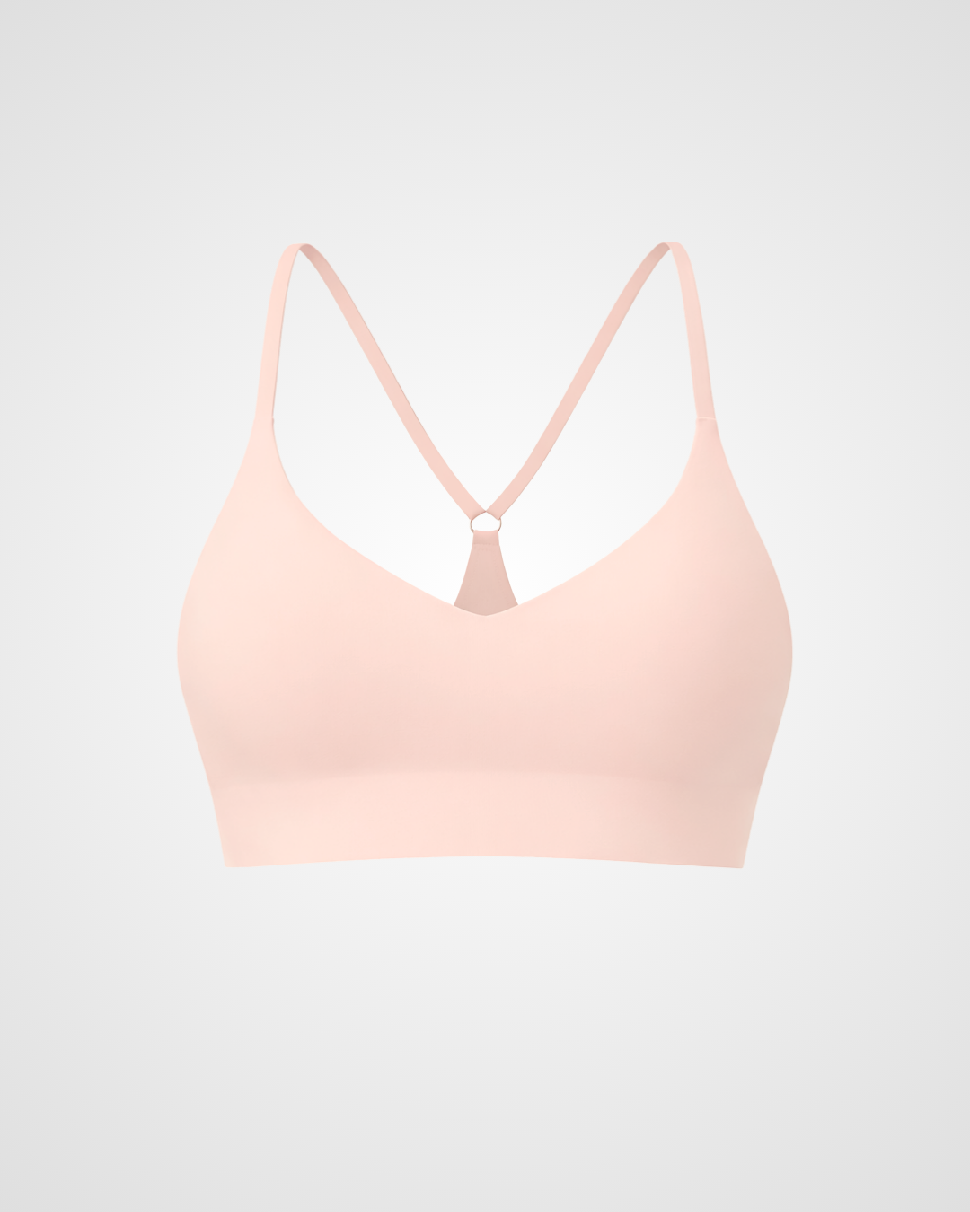 seamless sports bra light support flat lay blush coconut nuude