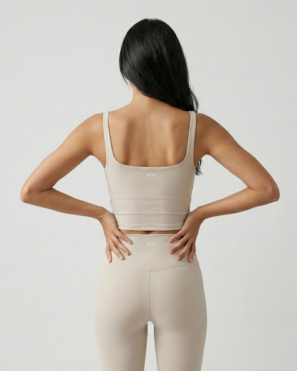 Cool stone activewear tank with square back and seamless sculpt design by Nuude