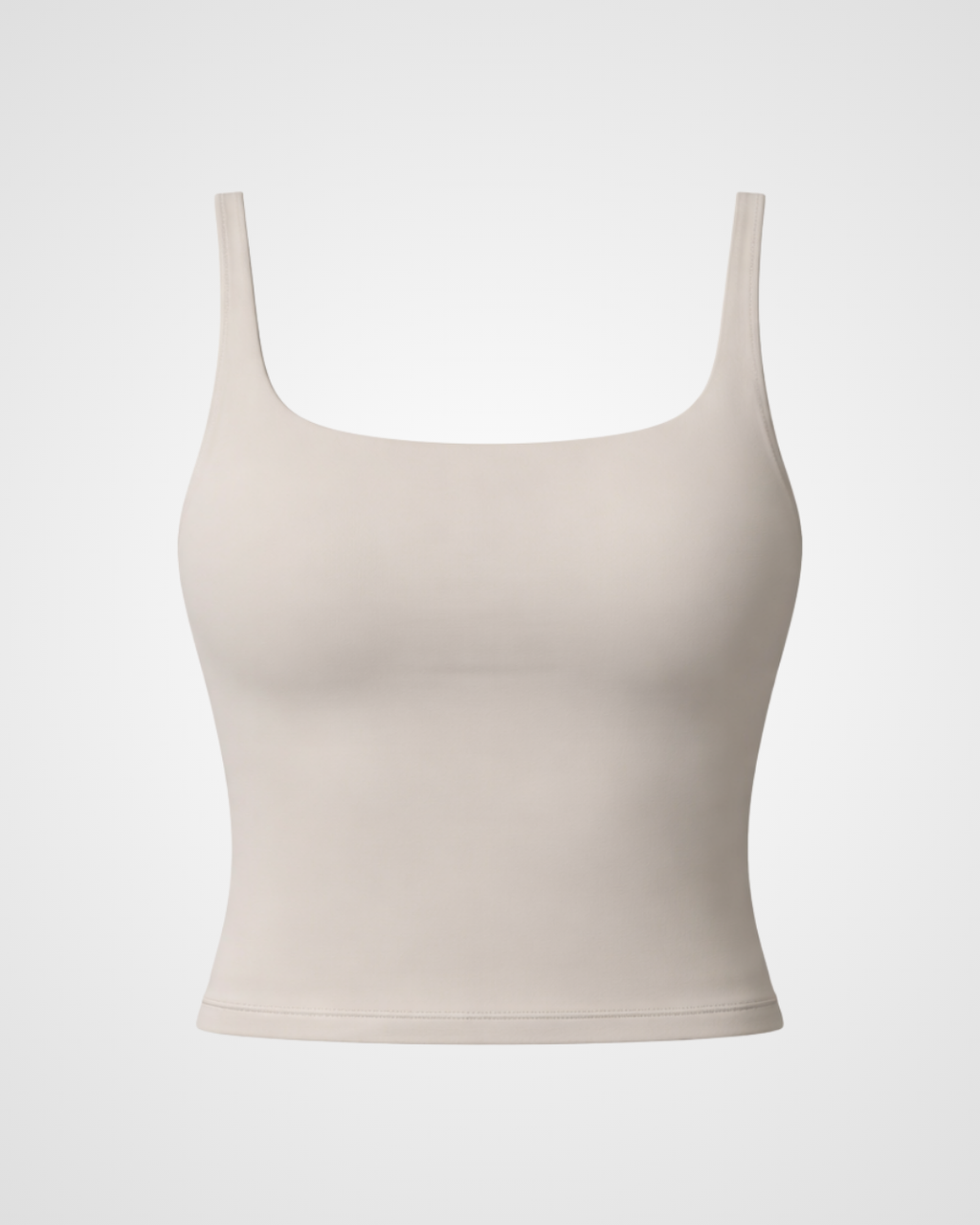 Cool stone square neck activewear tank laid flat with minimalist styling by Nuude